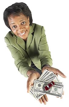 A woman holding cash